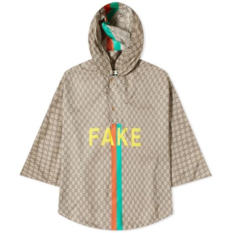 gucci fake poncho|Gucci poncho black.